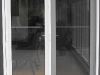 white-double-retractable-door-open